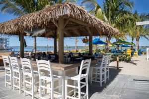 outdoor tiki bar on water